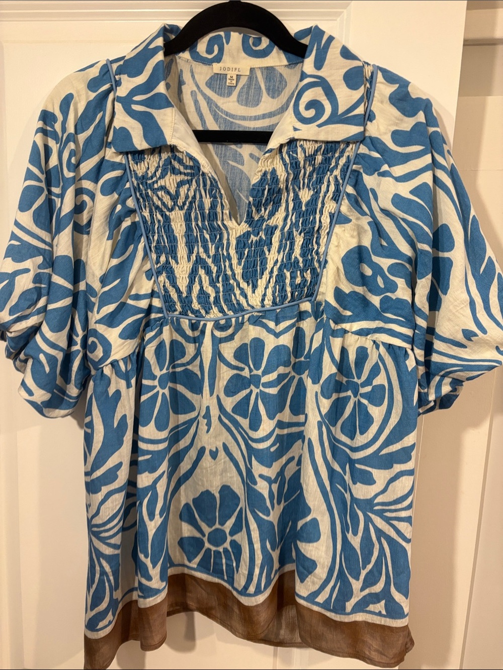 JODIFL Blue and White Floral Smocked V-Neck Tunic with Tan Hem